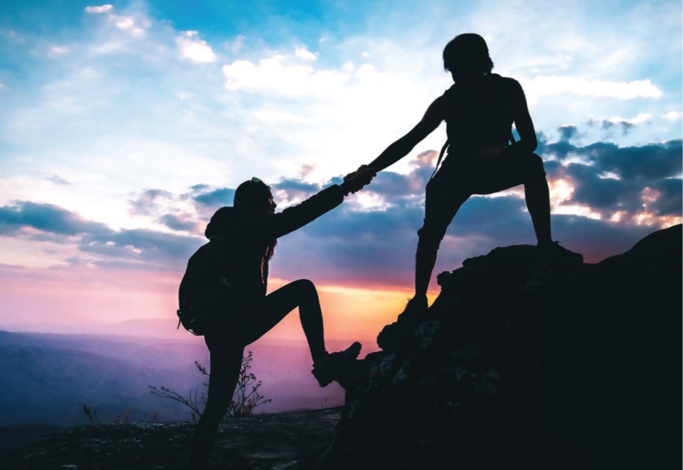 Hikers climbing a hill