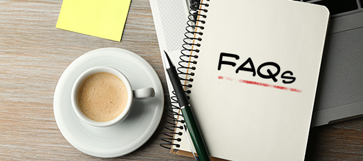 FAQs written on notepad